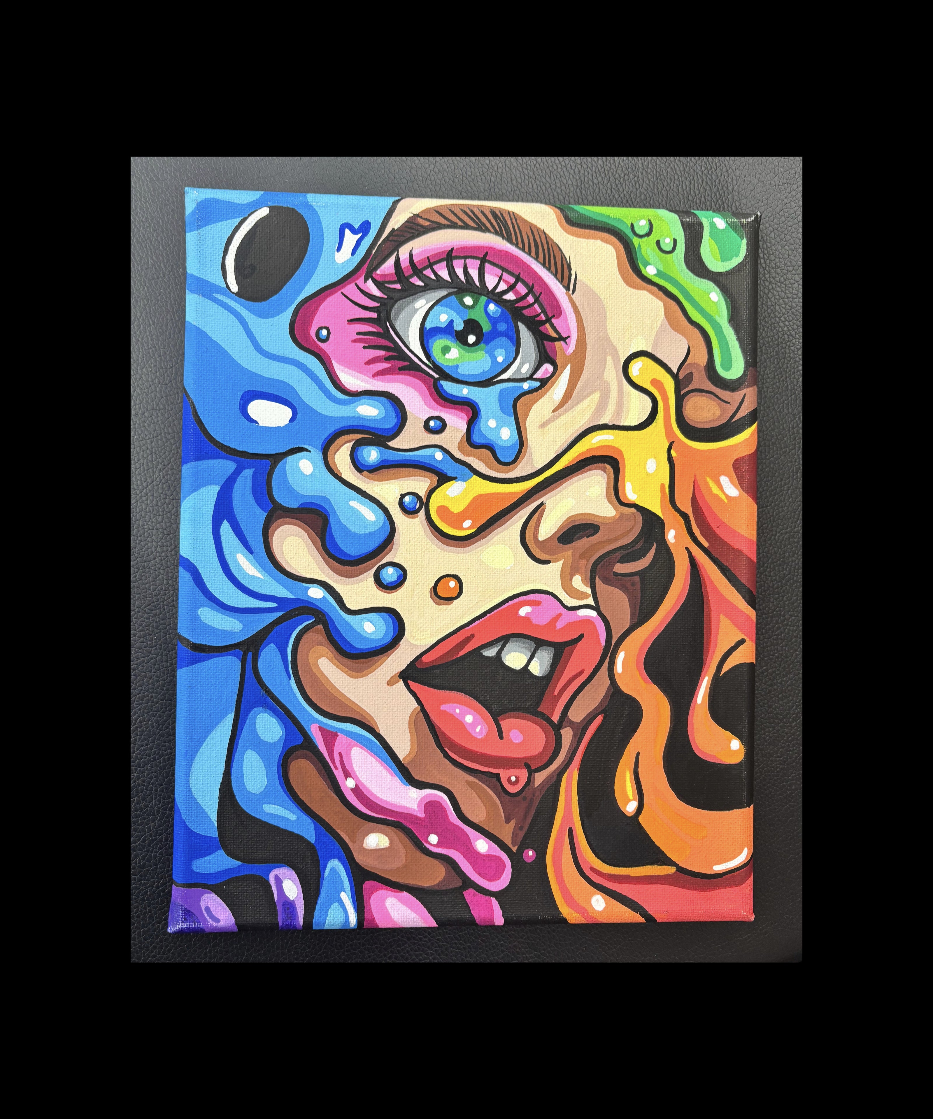colorful abstract womans face painting with big eye