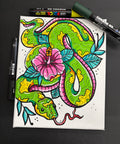 Colorful snake illustration on a white background with markers around. v8x10 acrylic markers on canvas by Hannah Arthur